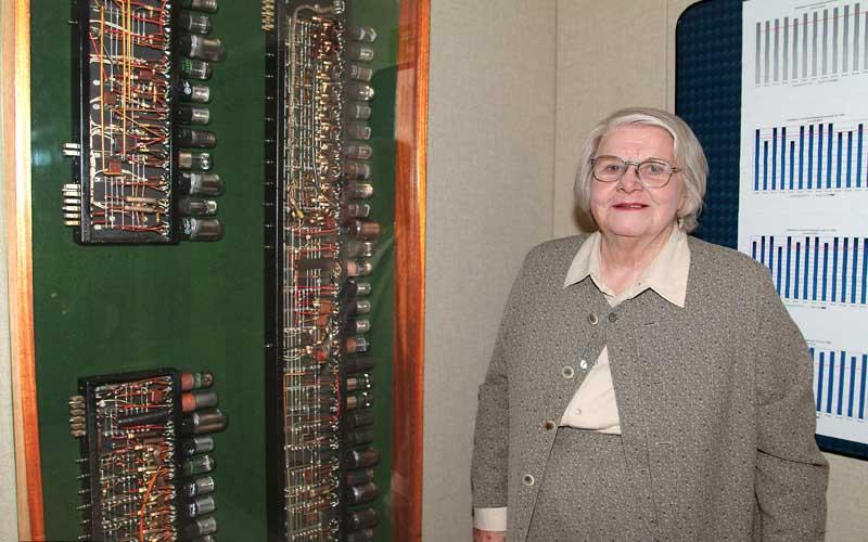 琼 Takes a Tour | 琼 Jennings Bartik standing in front of a display of ENIAC Decade Ring Counters at the U.S. Army Ordnance Museum at Aberdeen Proving Ground in Maryland. (Courtesy of Robert Sheroke, United States Army 研究 Laboratory, Aberdeen Proving Ground.) 